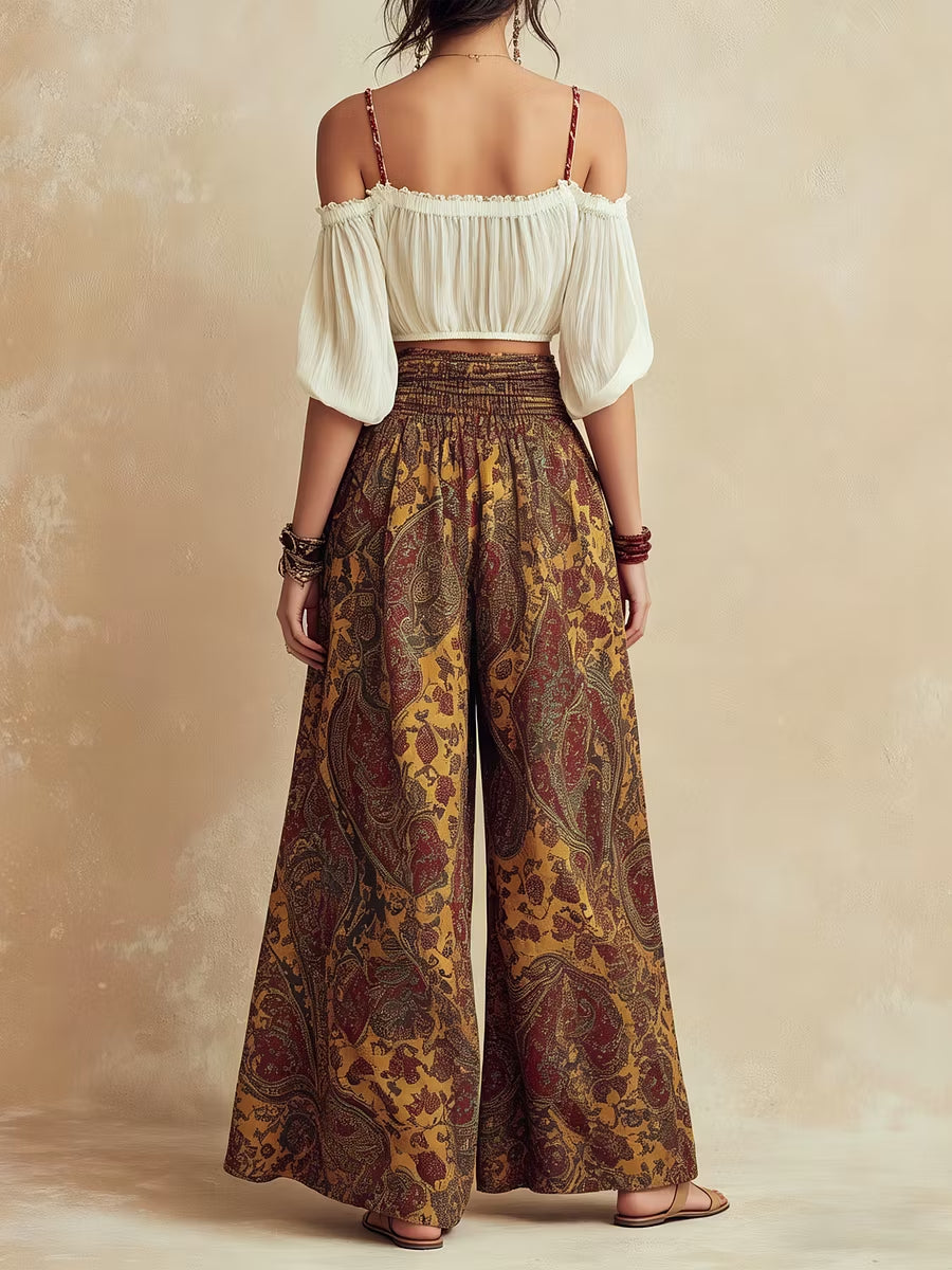 Off-the-shoulder crop top paired with printed wide-leg pants set